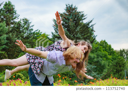 Couple having fun together outdoor. Couple having fun together outdoor. 113752740
