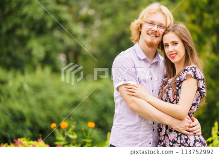 Happy man and woman having date outside 113752992