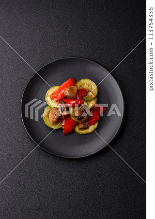 Delicious fresh grilled vegetables zucchini, bell peppers, mushrooms and onions 113754338