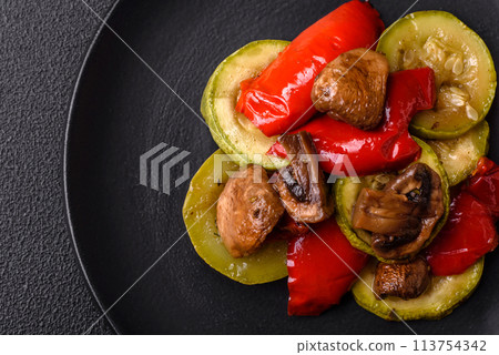Delicious fresh grilled vegetables zucchini, bell peppers, mushrooms and onions 113754342