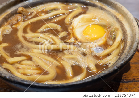 Nagoya's specialty: hot and delicious miso stewed udon Nagoya's specialty: hot and delicious miso stewed udon 113754374