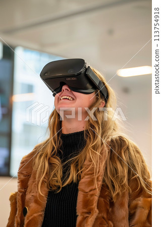 A woman wearing a brown coat 113754918