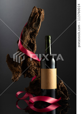 Bottle of red wine with old empty label. Bottle of red wine with old empty label. 113760014