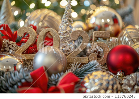 Festive 2025 numerals amidst Christmas decorations with warm golden tones 113760243