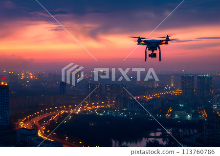 one drone over city at summer sunrise 113760786