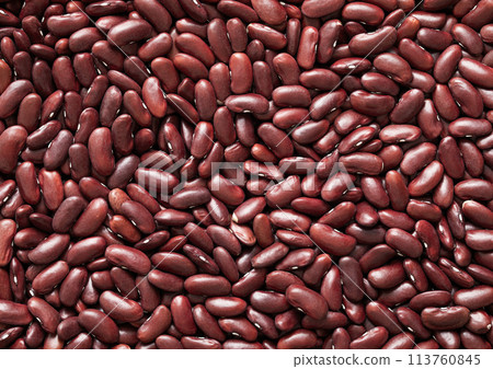 Red organic healthy dry raw white bean seeds textured background. Red organic healthy dry raw white bean seeds textured background. 113760845