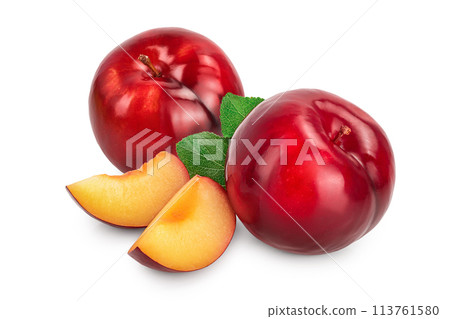 fresh red plum and slices with leaves isolated on white background fresh red plum and slices with leaves isolated on white background 113761580