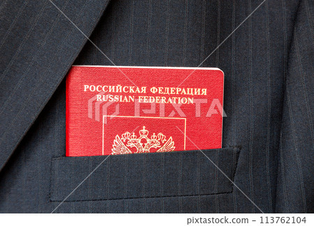 Russian passport sticking out of the pocket of a suit Russian passport sticking out of the pocket of a suit 113762104