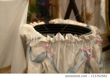 Baptismal font in a Christian church 113762662