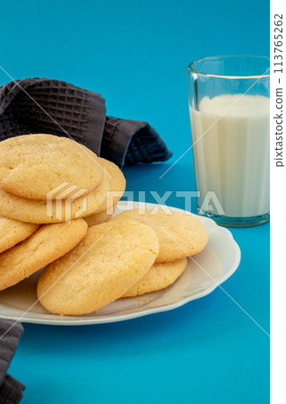 Delicious sugar cookies on wooden table, closeup Delicious sugar cookies on wooden table, closeup 113765262