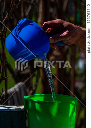 Green washbasin in the yard. Hand wash basin. 113765340