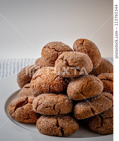 A group of Warm Homemade Gingersnap Cookies 113765344