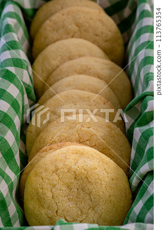 Delicious sugar cookies on wooden table, closeup 113765354