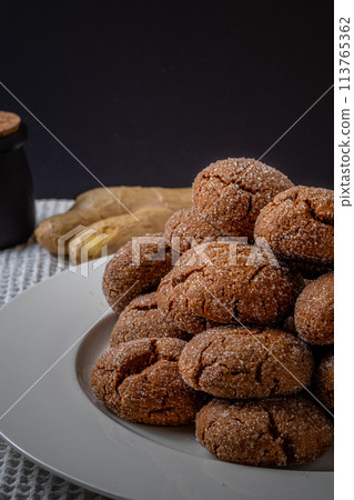 A group of Warm Homemade Gingersnap Cookies 113765362