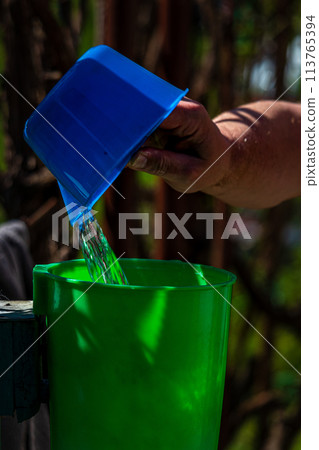 Green washbasin in the yard. Hand wash basin. 113765394