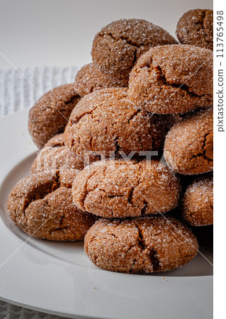 A group of Warm Homemade Gingersnap Cookies 113765498
