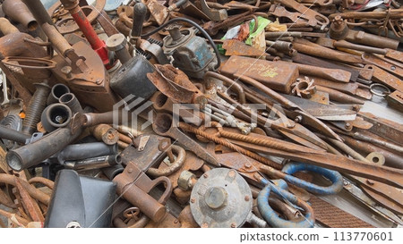 A flea market of old rusty things and tools. A flea market of old rusty things and tools. 113770601