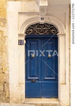 typical entrance doors of houses in Valletta, Malta 113772796