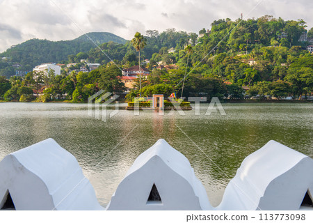 The small artificial island situated in the centre of Kandy lake, Sri Lanka. This island was used by the king's harem for bathing and was connected to the palace by secret tunnel. The small artificial island situated in the centre of Kandy lake, Sri Lanka. This island was used by the king's harem for bathing and was connected to the palace by secret tunnel. 113773098