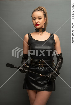 Beautiful dominant brunette mistress woman in... - Stock Photo [113773866]  - PIXTA