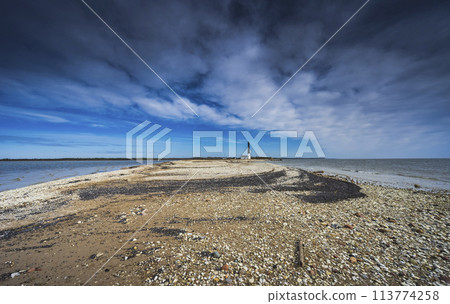 Pebble beach at the Sorve Lighthouse in Saaremma, Estonia Pebble beach at the Sorve Lighthouse in Saaremma, Estonia 113774258