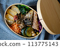 Healthy bento box containing only vegetables and fish 113775143