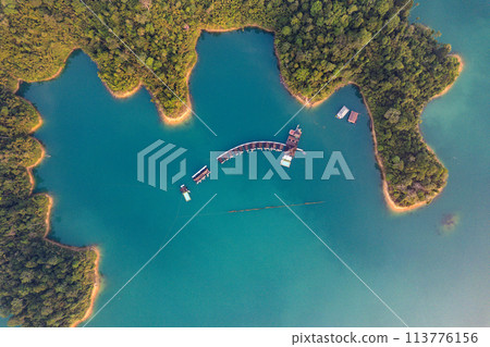 Floating bungalow on the Cheow lan Lake in Khao Sok National Park in Surat Thani, Thailand Floating bungalow on the Cheow lan Lake in Khao Sok National Park in Surat Thani, Thailand 113776156