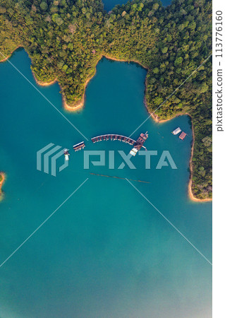 Floating bungalow on the Cheow lan Lake in Khao Sok National Park in Surat Thani, Thailand Floating bungalow on the Cheow lan Lake in Khao Sok National Park in Surat Thani, Thailand 113776160