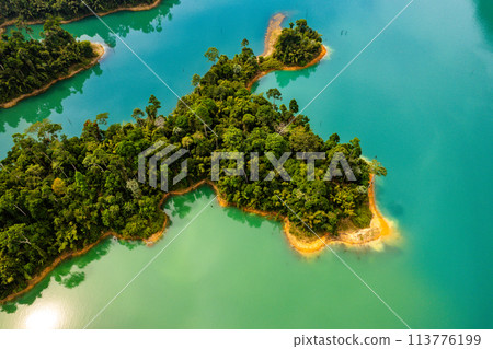 Aerial view of Khao Sok national park, in Cheow lan lake, Surat Thani, Thailand Aerial view of Khao Sok national park, in Cheow lan lake, Surat Thani, Thailand 113776199