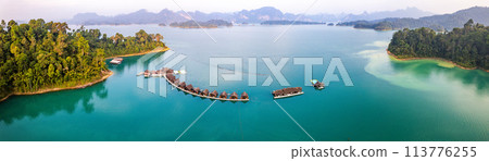Floating bungalow on the Cheow lan Lake in Khao Sok National Park in Surat Thani, Thailand Floating bungalow on the Cheow lan Lake in Khao Sok National Park in Surat Thani, Thailand 113776255