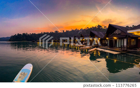 Floating bungalow on the Cheow lan Lake in Khao Sok National Park in Surat Thani, Thailand Floating bungalow on the Cheow lan Lake in Khao Sok National Park in Surat Thani, Thailand 113776265