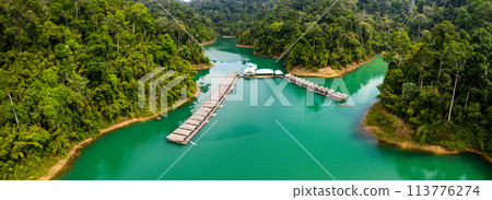 Floating bungalow on the Cheow lan Lake in Khao Sok National Park in Surat Thani, Thailand Floating bungalow on the Cheow lan Lake in Khao Sok National Park in Surat Thani, Thailand 113776274