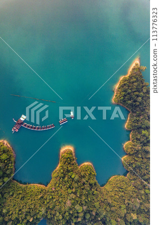 Floating bungalow on the Cheow lan Lake in Khao Sok National Park in Surat Thani, Thailand 113776323