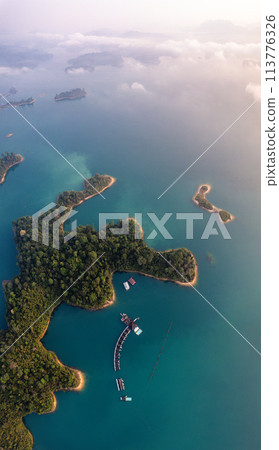 Floating bungalow on the Cheow lan Lake in Khao Sok National Park in Surat Thani, Thailand 113776326