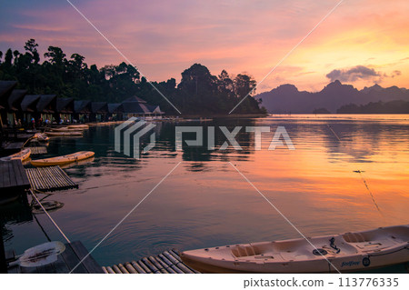 Floating bungalow on the Cheow lan Lake in Khao Sok National Park in Surat Thani, Thailand Floating bungalow on the Cheow lan Lake in Khao Sok National Park in Surat Thani, Thailand 113776335