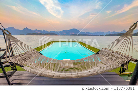 Floating bungalow on the Cheow lan Lake in Khao Sok National Park in Surat Thani, Thailand 113776391