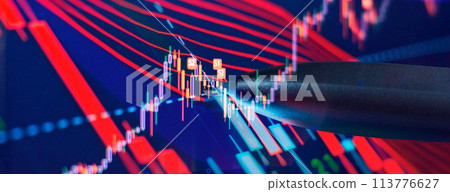 Charts of financial instruments with various type of indicators including volume analysis for professional technical analysis on the monitor of a computer. Charts of financial instruments with various type of indicators including volume analysis for professional technical analysis on the monitor of a computer. 113776627