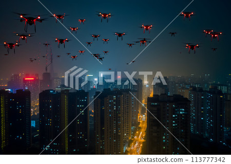 swarm of drones over city at summer night 113777342