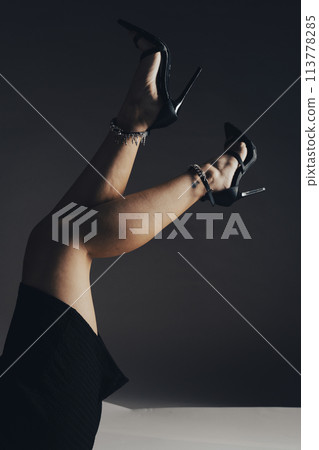 Female fashion model posing long legs Female fashion model posing long legs 113778285