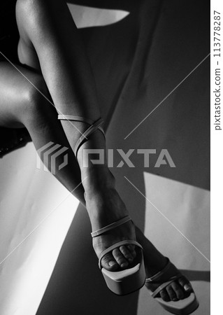 Model posing with long sexy legs Model posing with long sexy legs 113778287