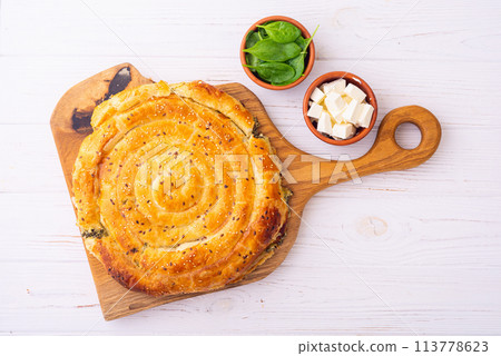 Traditional greek food . Baked spanakopita with feta and spinach 113778623