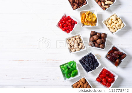 Mix of dried and candied fruits and nuts Mix of dried and candied fruits and nuts 113778742