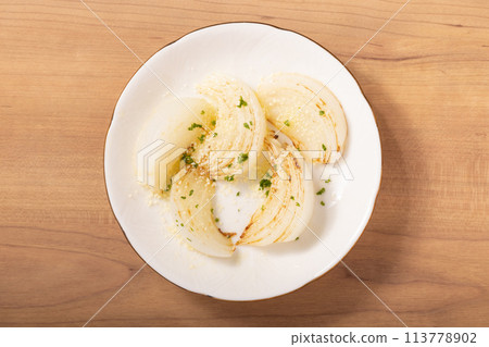 Grilled New Onion with Powdered Cheese Grilled New Onion with Powdered Cheese 113778902