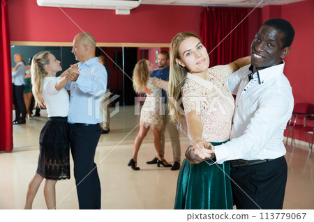 People dancing slow ballroom dances in pairs People dancing slow ballroom dances in pairs 113779067