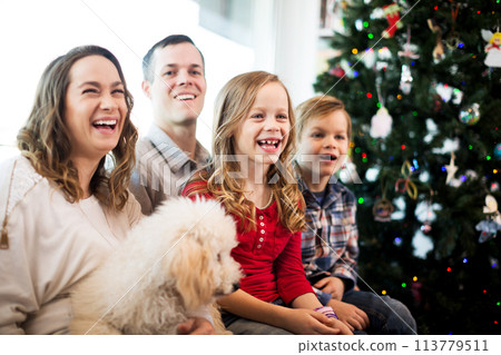 Parents and children happy to spend Christmas together Parents and children happy to spend Christmas together 113779511