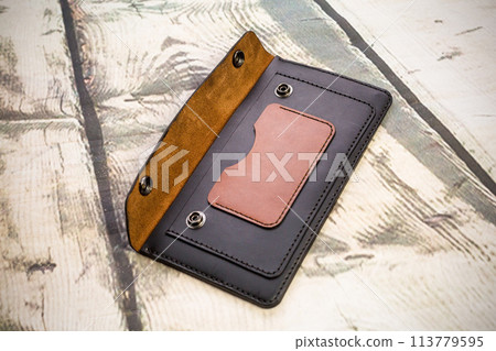 Wallet made of genuine leather, photo for the catalog of an e-commerce store on a social network Wallet made of genuine leather, photo for the catalog of an e-commerce store on a social network 113779595