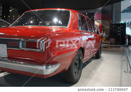 A bright red Skyline 2000GTR on display in the showroom A bright red Skyline 2000GTR on display in the showroom 113780697