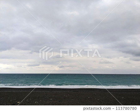 Hualien, Taiwan - 11.26.2022: Qixingtan Beach with no people facing the wavy Pacific Ocean on a stormy day under clouds during the pandemic Hualien, Taiwan - 11.26.2022: Qixingtan Beach with no people facing the wavy Pacific Ocean on a stormy day under clouds during the pandemic 113780780