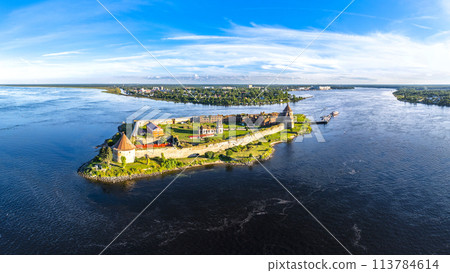 Europe. Russia, Leningrad region, St. Petersburg, Aerial panoramic view on fortress Oreshek near Schlesselburg town. Ancient Russian fort on island in Ladoga lake in sunny summery day 113784614