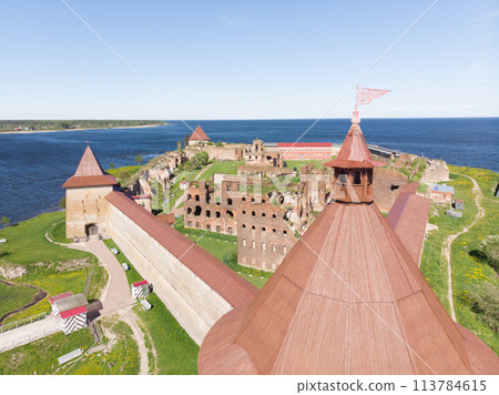 Europe. Russia, Leningrad region, St. Petersburg, Aerial panoramic view on fortress Oreshek near Schlesselburg town. Ancient Russian fort on island in Ladoga lake in sunny summery day 113784615